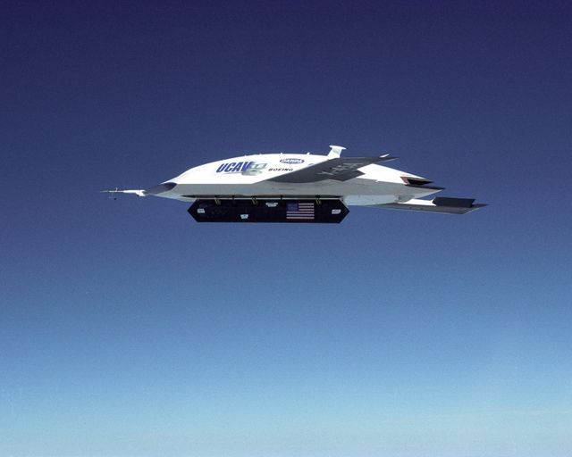 X-45A Air Vehicle #1 during flight #13, with weapons bay door open - Download Free Stock Photos Pikwizard.com