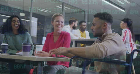 Diverse Team Collaborating Amidst Digital Financial Data