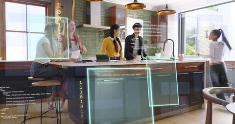 Multigenerational team collaborating around modern kitchen island with ar overlays
