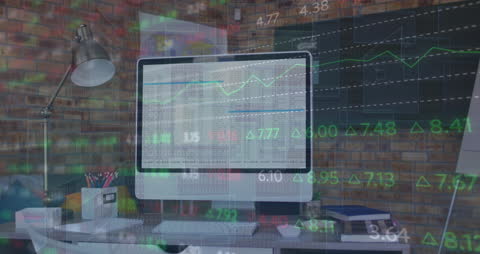 Animated Stock Market Data with Computer on Office Desk