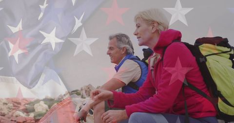 Senior Couple Enjoying Hike with US Flag Overlay