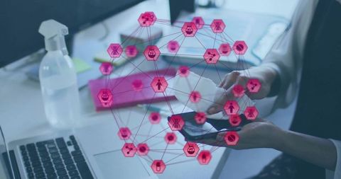 Asian woman holding mask using smartphone at desk with magenta health network overlay