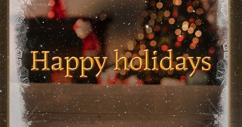 Festive Happy Holidays Greeting with Snowfall and Christmas Decor - Download Free Stock Images Pikwizard.com