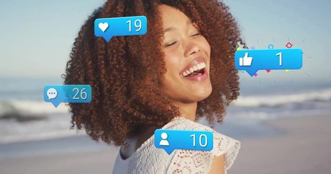 Joyful Woman on Beach with Virtual Social Media Engagement Icons