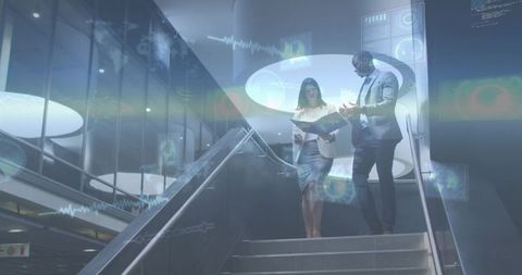 Business professionals descending atrium stairs reviewing folder with HUD data overlay