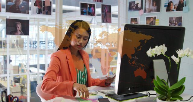 Composition of world map and data processing over asian businesswoman using computer - Download Free Stock Photos Pikwizard.com
