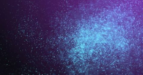 Glowing Particle Movement on Dark Background - Download Free Stock Images Pikwizard.com
