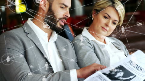 Business Team Discussing Strategy Over Business Newspaper with Digital Overlay