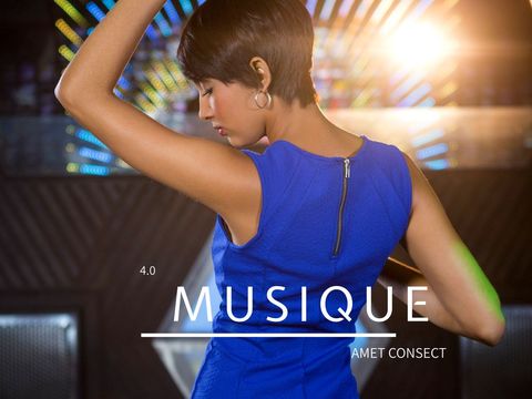 Young woman dancing at modern nightclub with vibrant light show