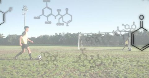 Soccer Player Dribbling Toward Goal with Molecular Chemistry Overlay for Sports Science