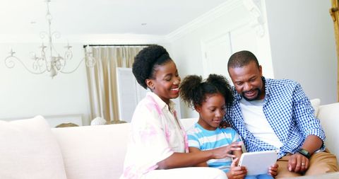 Happy Family Bonding at Home with Tablet Technology