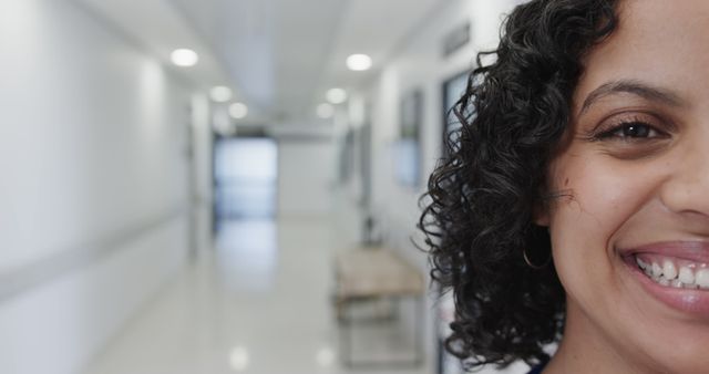 Smiling Woman in Hospital Hallway - Download Free Stock Images Pikwizard.com