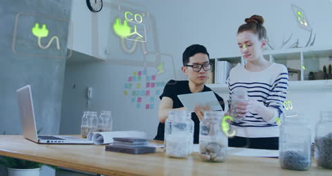 Colleagues Collaborating on Sustainable Eco-Friendly Project