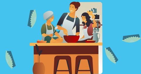 Cheerful Family Cooking Together in Home Kitchen