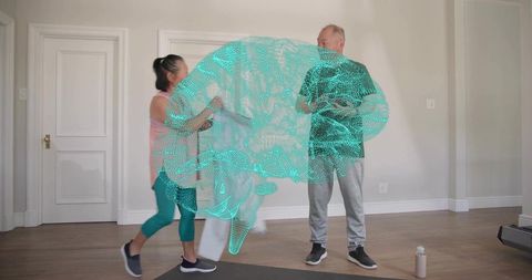 Senior couple practicing resistance band flow with teal holographic mesh in home studio