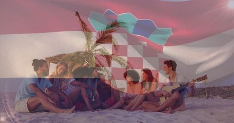 Sunset beach gathering with friends and acoustic guitar