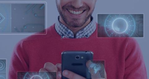 Smiling man using smartphone with futuristic HUD and augmented reality overlays