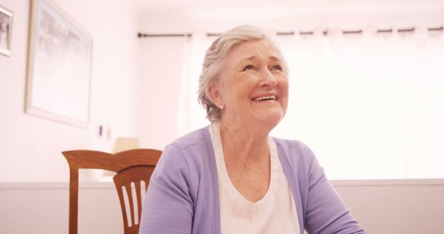 Happy Senior Woman Smiling at Home - Download Free Stock Images Pikwizard.com