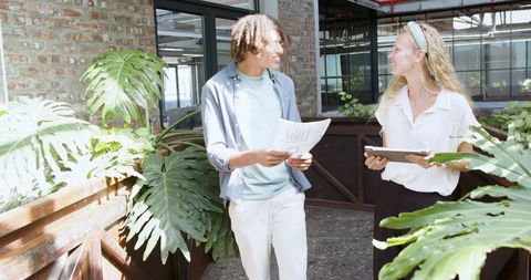 Team Collaboration in Modern Urban Workspace with Colleagues