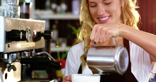 Smiling Barista Making Coffee with Espresso Machine in Café - Download Free Stock Images Pikwizard.com