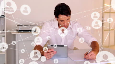 Businessman Using Digital Tablet with Networking Icons Overlay