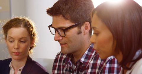 Diverse Business Team Collaborating in Sunlit Office - Download Free Stock Images Pikwizard.com