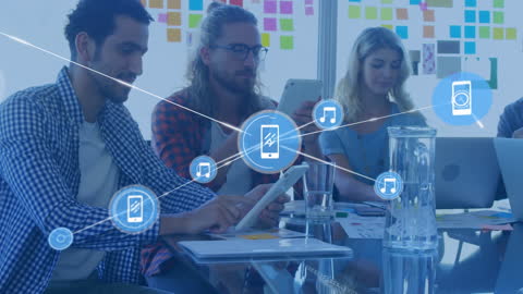 Diverse Team Collaborating with Digital Technology in Office Workspace