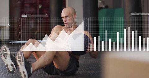 Athletic Man Training with Medicine Ball and Data Visualization