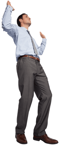Confident businessman with hands raised transparent background