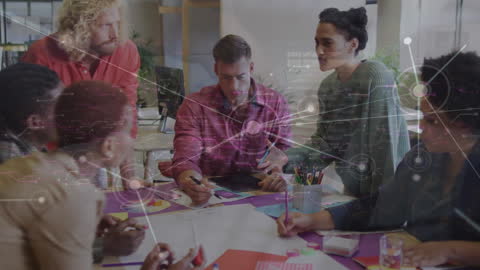 Collaborative Teamwork Amidst Digital Connections in Modern Office