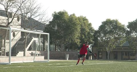 Young Soccer Player in Action on Sunny Day