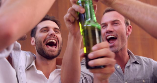 Group of Excited Friends Celebrating with Drinks - Download Free Stock Images Pikwizard.com