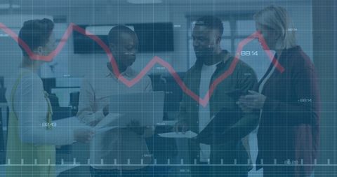 Diverse Business Team Reviewing Financial Data in Office