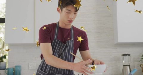 Teenage Chef in Modern Kitchen with Decorative Stars