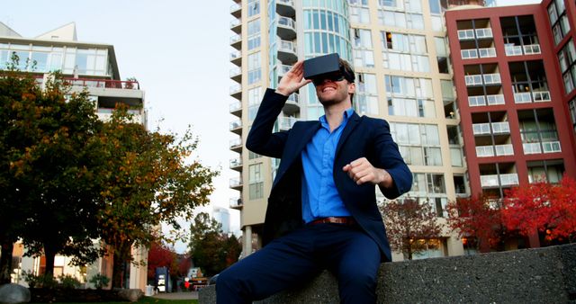 Businessman Using Virtual Reality Headset Outdoors in Urban Setting - Download Free Stock Images Pikwizard.com
