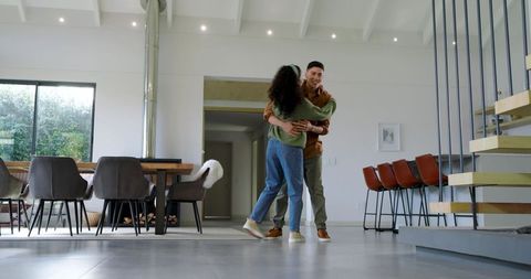 Happy Couple Hugging in Modern Minimalist Living Space