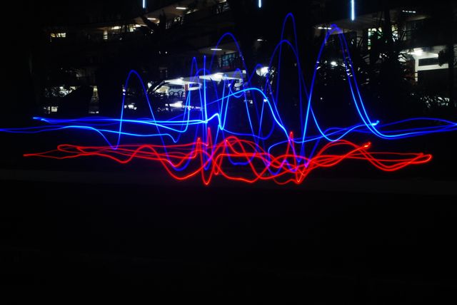 Colorful Light Trails with Blue and Red Streaks in Dark Urban Environment - Download Free Stock Photos Pikwizard.com