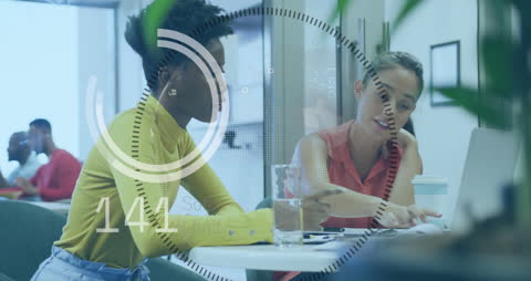 Business Professionals Collaborating in Modern Office with Data Overlay