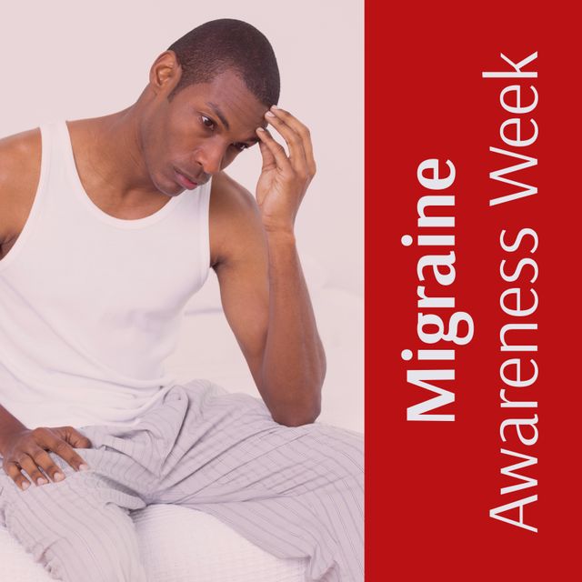 Image depicting African American man sitting on bed, holding his head with a pained expression. Perfect for migraine awareness campaigns, health articles, blog posts about dealing with migraines, and promoting healthcare solutions.