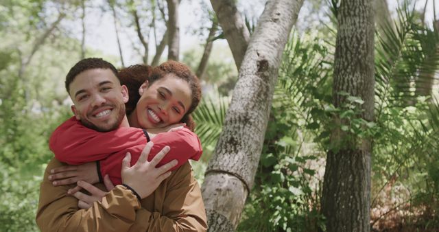 Happy Couple Embracing in Nature Park During Springtime - Download Free Stock Images Pikwizard.com