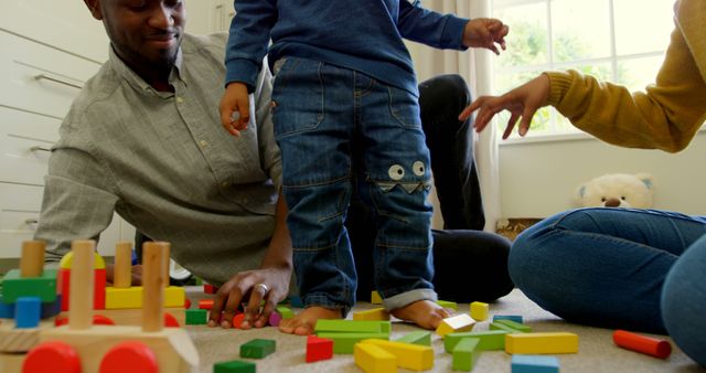 Family Playtime with Colorful Building Blocks Indoors - Download Free Stock Images Pikwizard.com