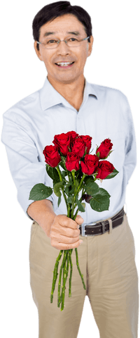 Joyful Elderly Asian Man Offering Transparent Red Roses With a Smile