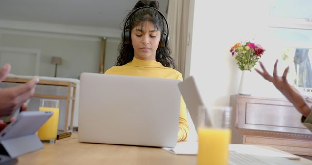 Focused Young Woman Remote Working on Laptop in Bright Room - Download Free Stock Images Pikwizard.com