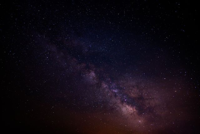 Astounding image of the Milky Way galaxy illuminating the night sky. Ideal for use in articles, educational content, and multimedia about astronomy, space exploration, or celestial events. Inspires curiosity and awe for the cosmos, suitable for backgrounds, screensavers, and science presentations.