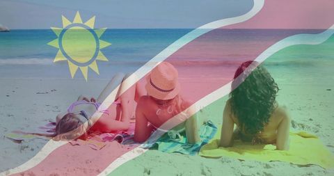 Women Relaxing on Beach Vacation Under Sun with Bikinis and Towels