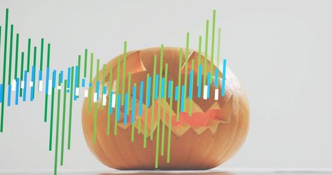Glowing jack-o'-lantern with colorful soundwave overlay creating modern halloween mood