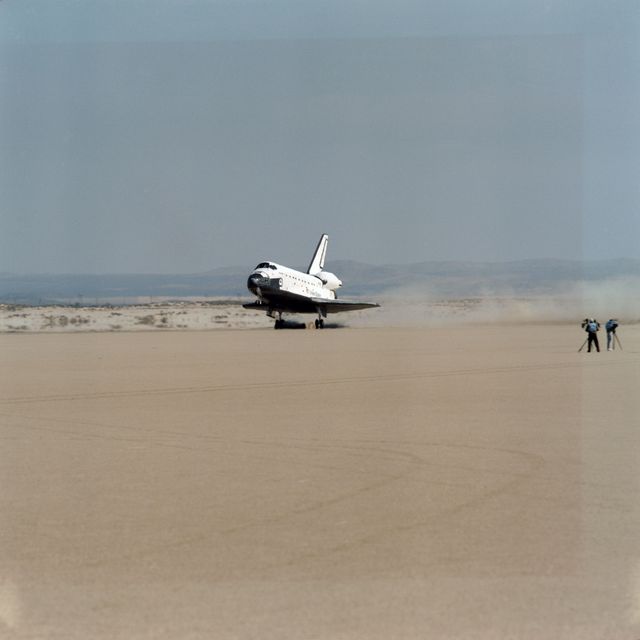 This captivating shot of Space Shuttle Atlantis touching down at Edwards Air Force Base in California on March 3, 1990, showcasing the completion of the STS-36 mission. Ideal for topics on space exploration, historical accomplishments of NASA, aerospace engineering, and man's achievements in space travel. Useful for educational resources, commemorative materials, and articles on the evolution of space missions.