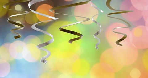 Festive Streamers on Vibrant Background Celebrating New Year - Download Free Stock Images Pikwizard.com