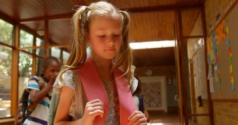 Sad Girl Bullied by Peers in School Hallway - Download Free Stock Images Pikwizard.com