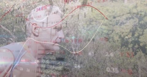 Jogging senior man with chart overlays on wooded trail, fitness endurance and data concept